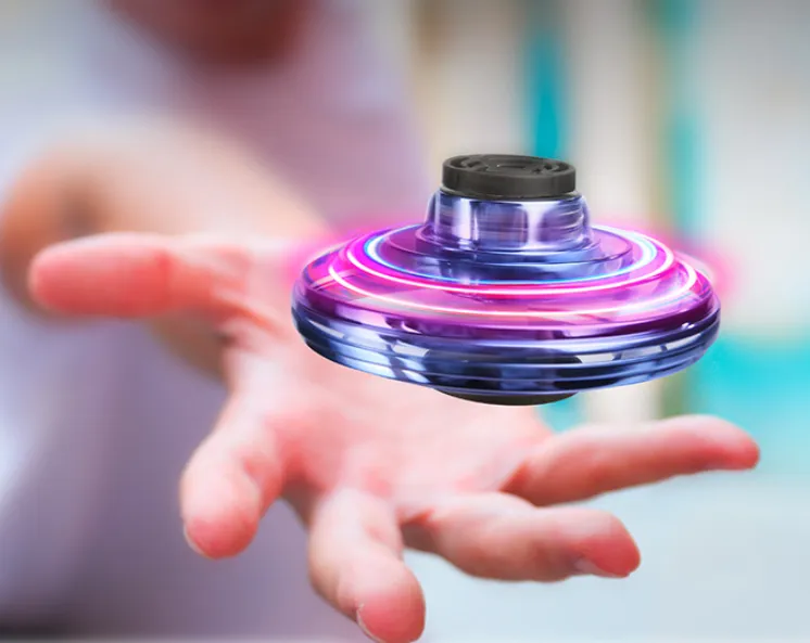 Mini Fingertip Gyro Drone with LED, UFO design, and interactive spinning feature for kids