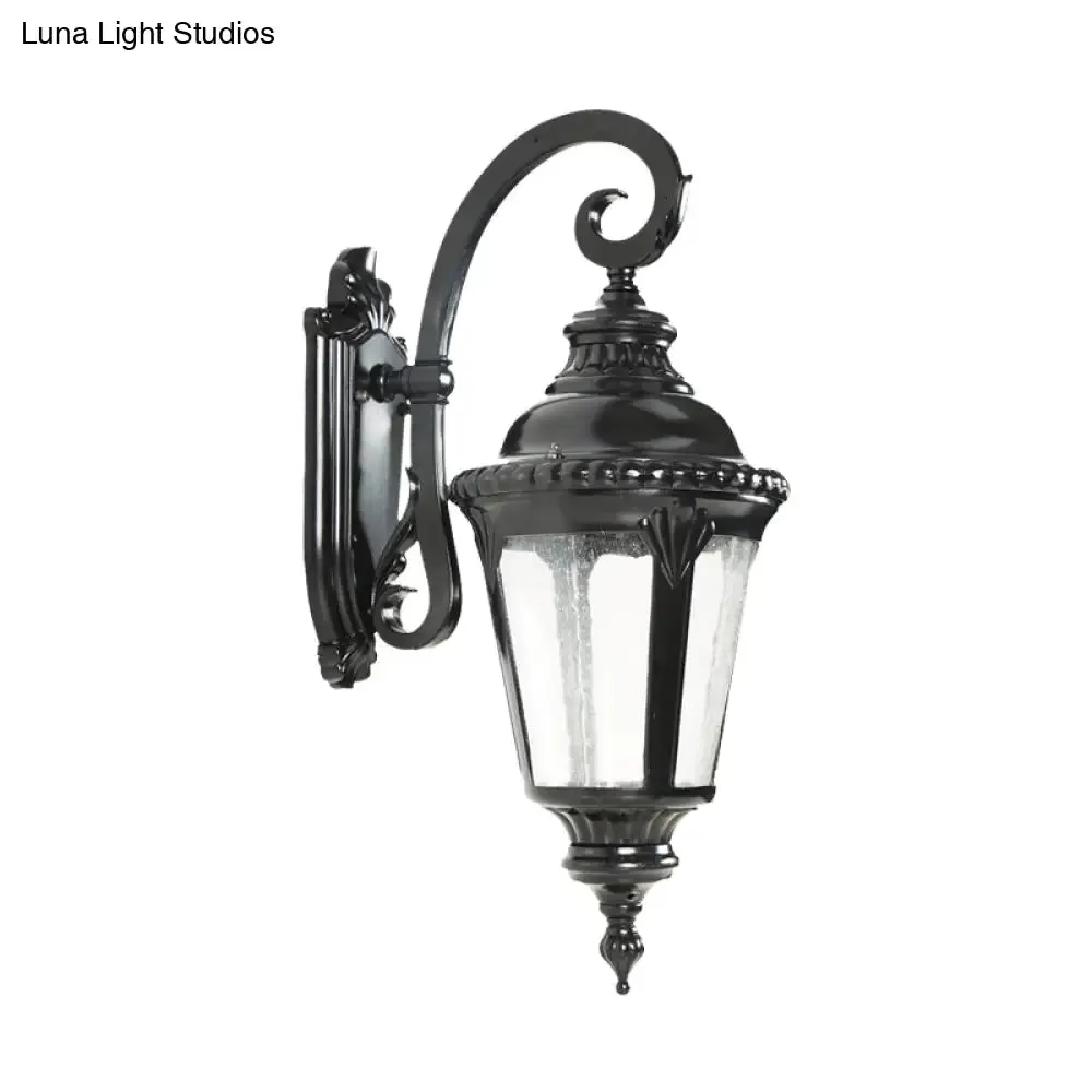 Rustic Courtyard Wall Lighting: 1-Light Sconce with Urn Clear Seeded Glass Shade in Black